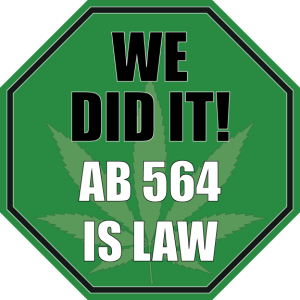 Green octagonal sign with a faint marijuana leaf in the background. Bold text reads: "WE DID IT! AB 564 IS LAW. CA Norml